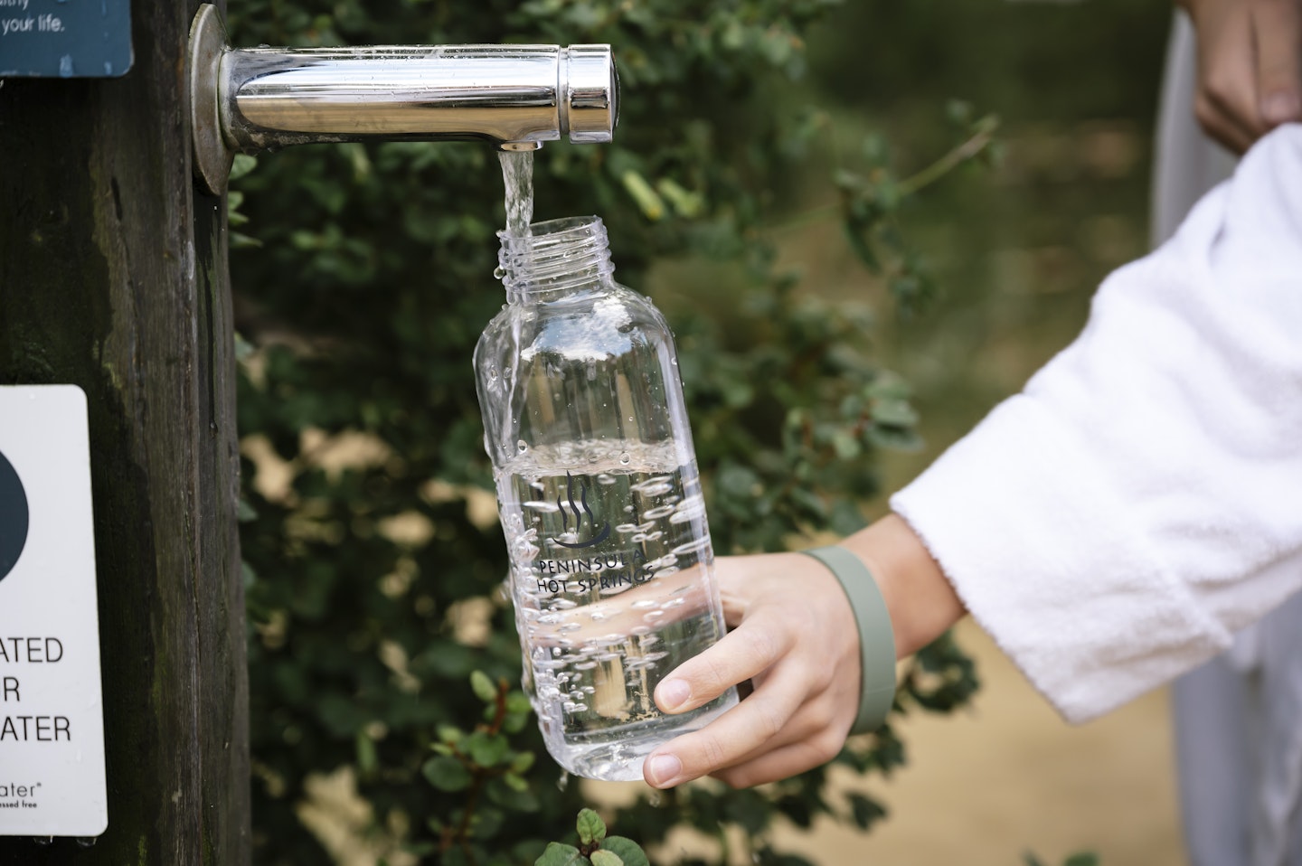 A tap of water poured