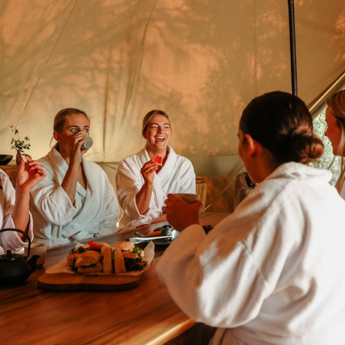 A group of guests in the tea house