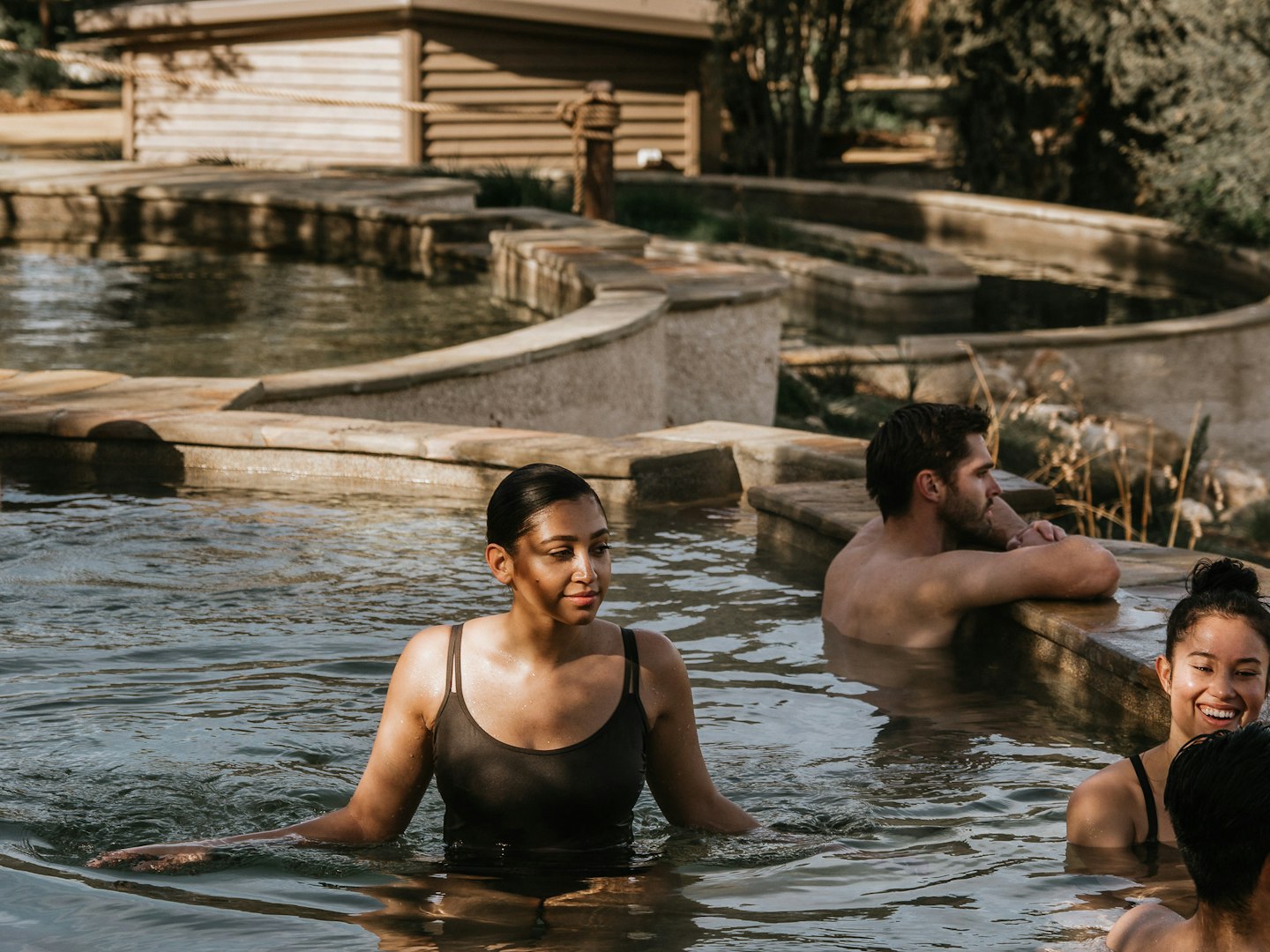 A group of friends in a geothermal pool