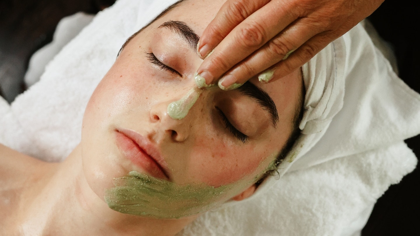 A young women getting a facial
