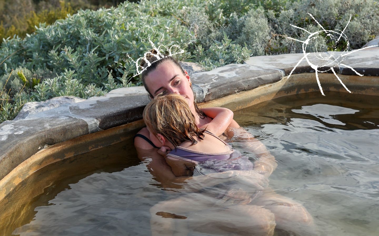 Mother bathing with her daughter