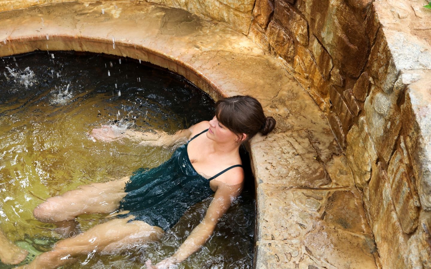 Woman bathing in spa dreaming centre