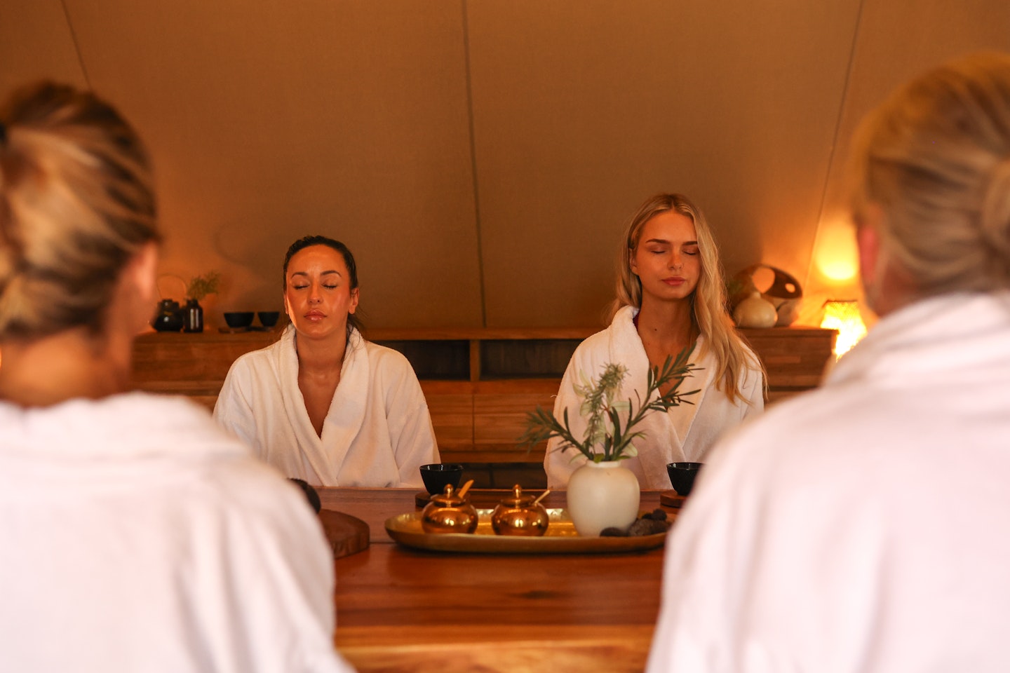 A group of people meditating during a cacao circle