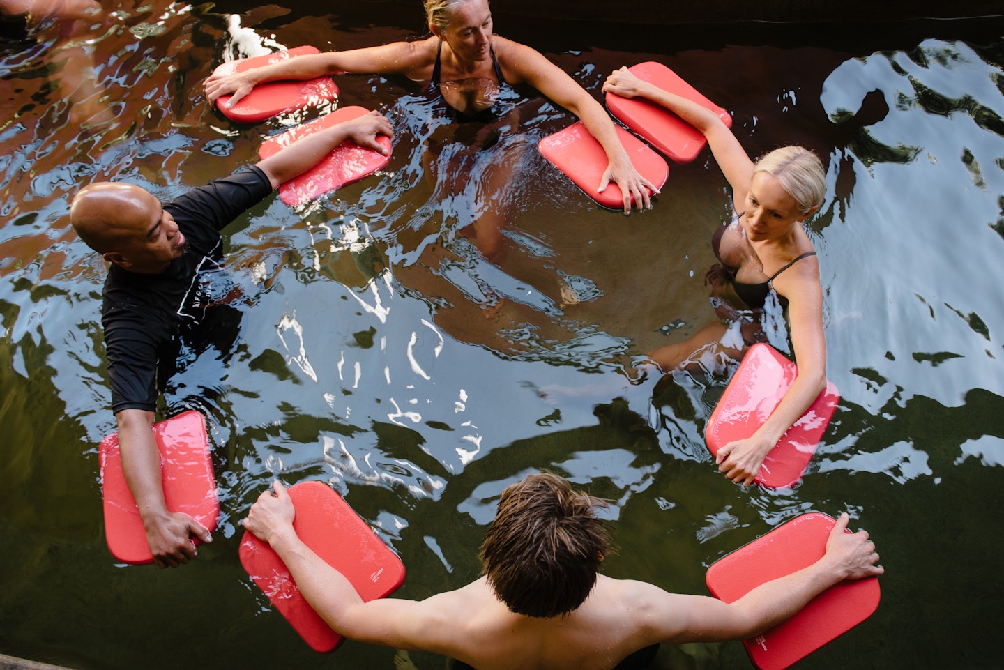 A group doing warm water exercises