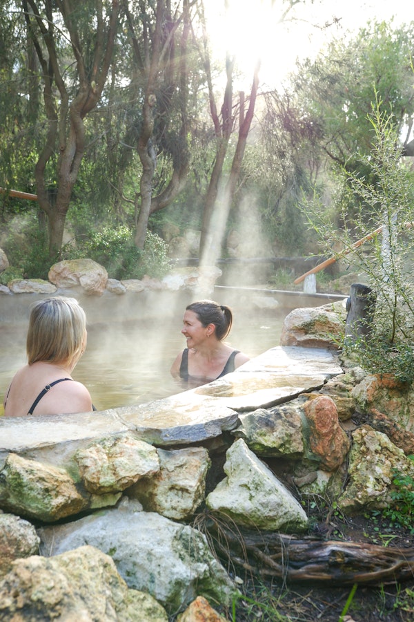Two woman bathing in hot springs