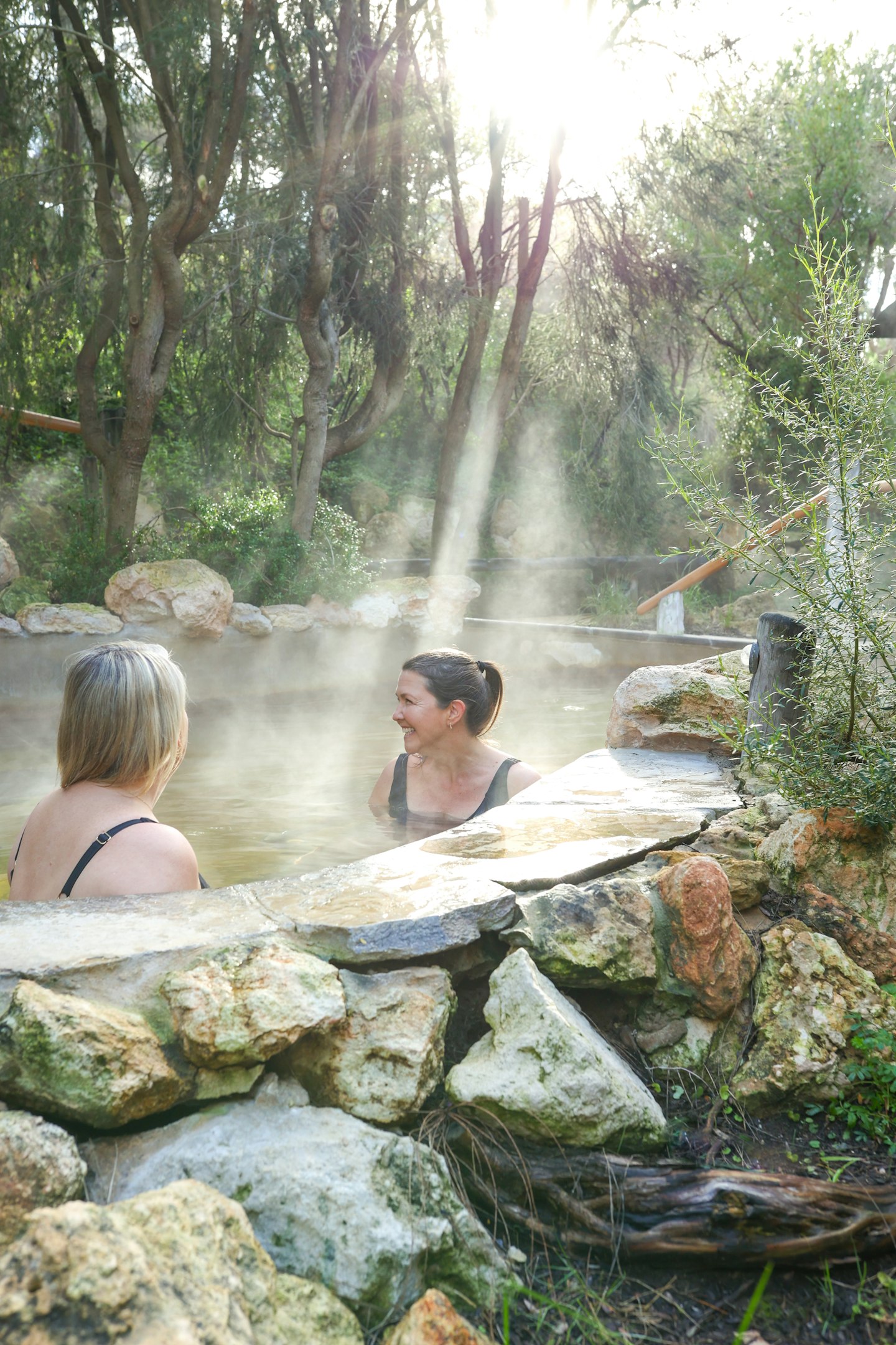 Two woman bathing in hot springs