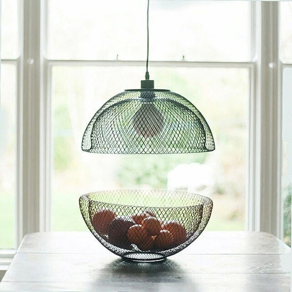 For your table or your ceiling - NEST system is a powder coated metal bowl, ideal for fruit, bread, or vegetables.