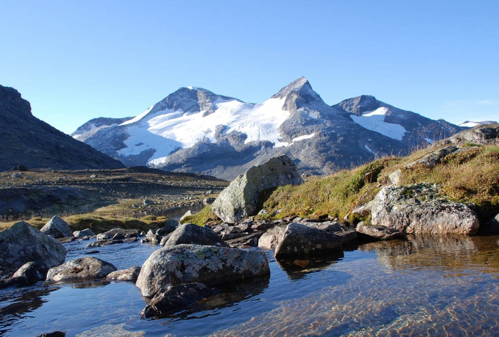 Velkommen opp sier Rauddalstindane på sin helt spesielle måte. Foto: Per-Arne Andersen Store Rauddalstinden Jotunheimen Leirvassbu