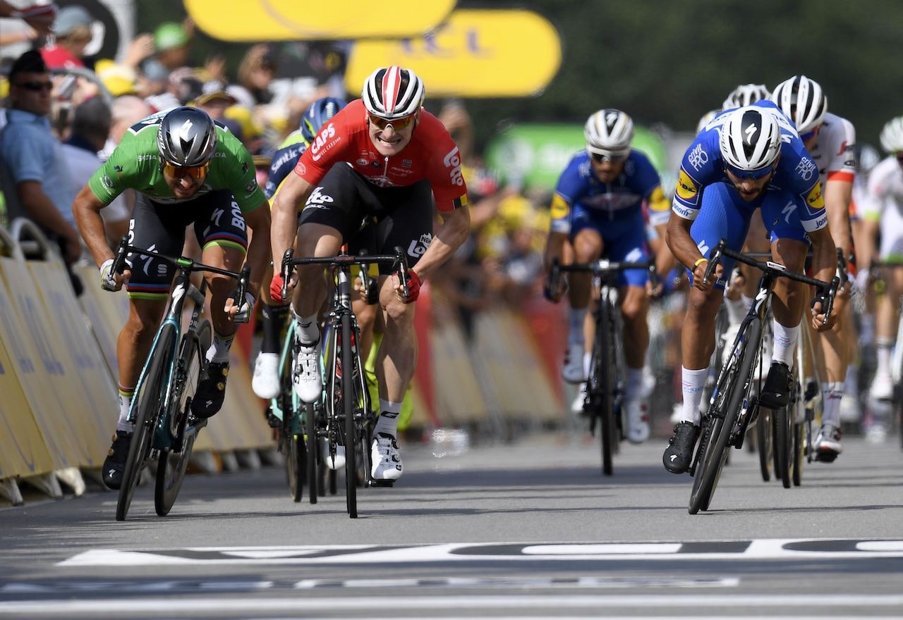 TO AV TRE: Fernando Gaviria noterte seg for sin andre etappeseier i Sarzeau. Foto: Cor Vos.  TO AV TRE: Fernando Gaviria noterte seg for sin andre etappeseier i Sarzeau. Foto: Cor Vos.