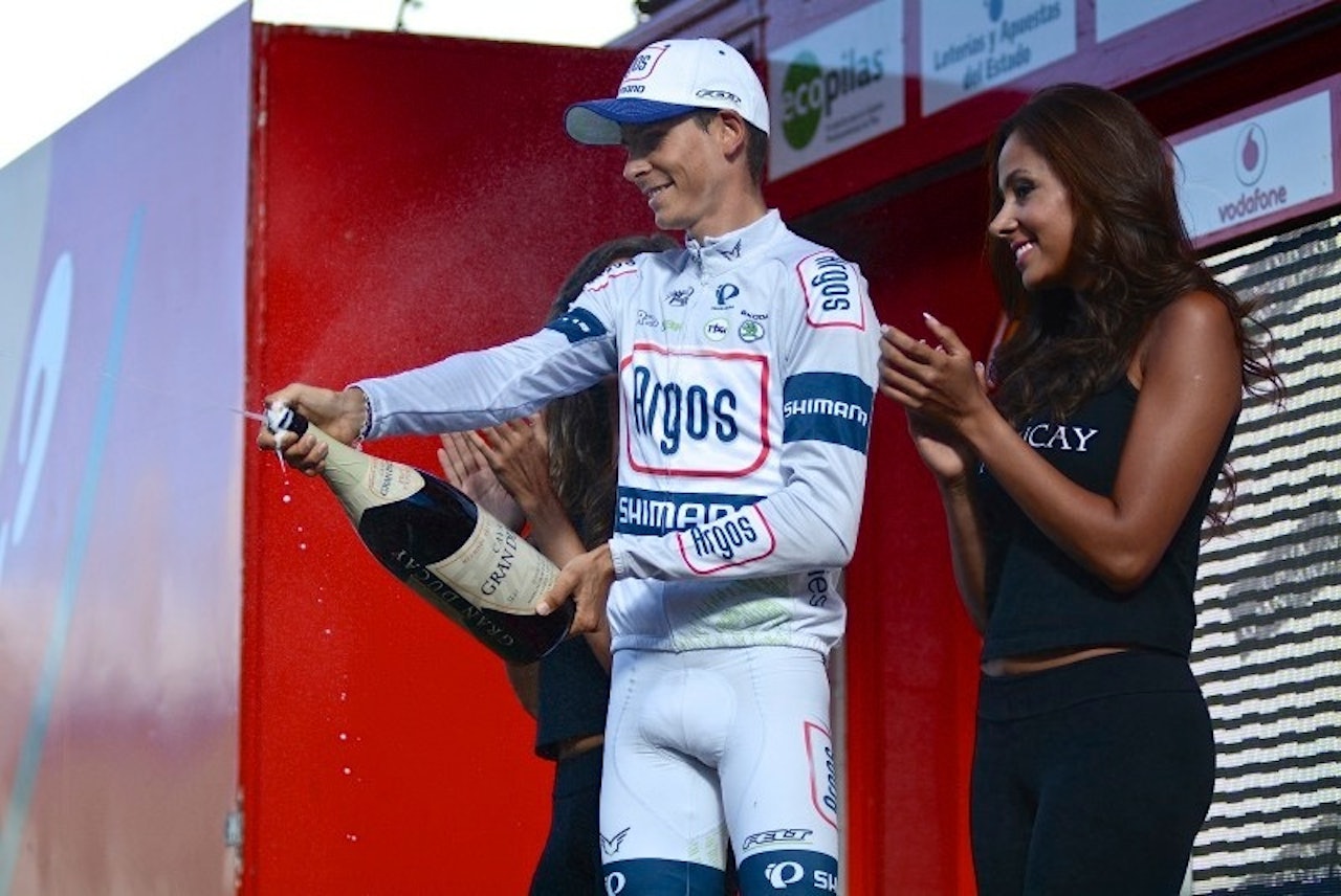 SEIERSVANT: Unge Warren Barguil har tydeligvis fått sansen for både cava og podiumpiker i løpet av Vueltan.