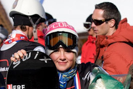 Helene er blitt godt vant med medaljer om halsen. Arkivbilde fra tidligere konkurranse. Helene er blitt godt vant med medaljer om halsen. Arkivbilde fra tidligere konkurranse.