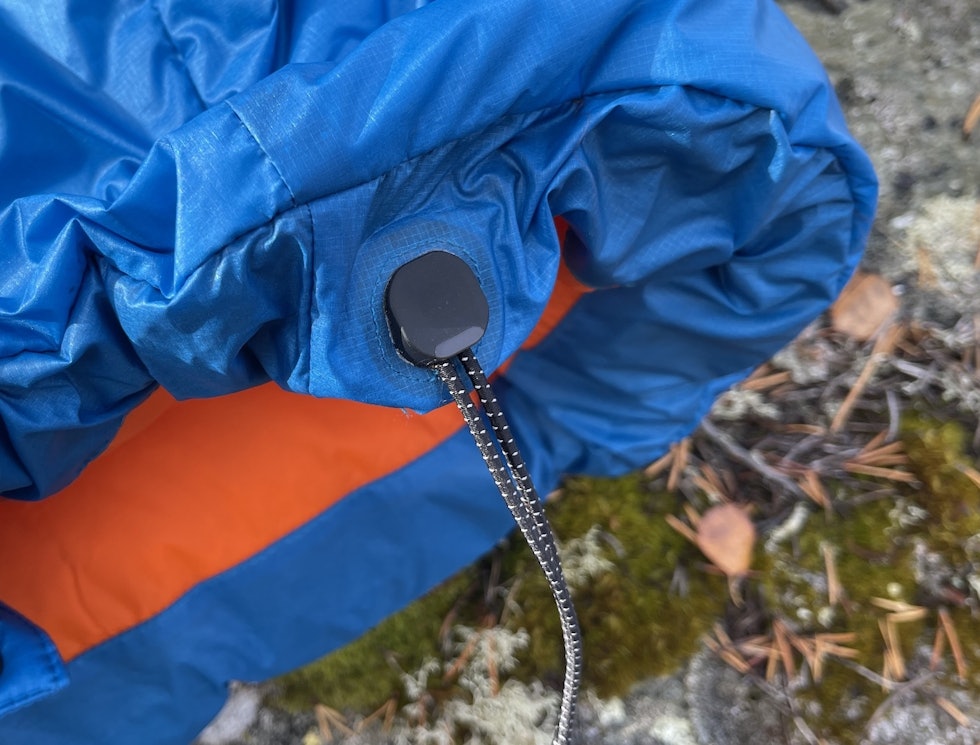 Hendig: Bra mekanisme for stramming i livet. Stram strikken og klem for å løsne. Mammut Eigerjoch Pro IN Hooded Jacket stramming