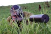 Skyting - Uttrykk, begrep og forklaringer jeger ligger i gresset sikter med rifle
