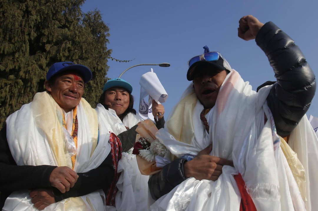 Nepalesiske klatrere etter bestigning av K2