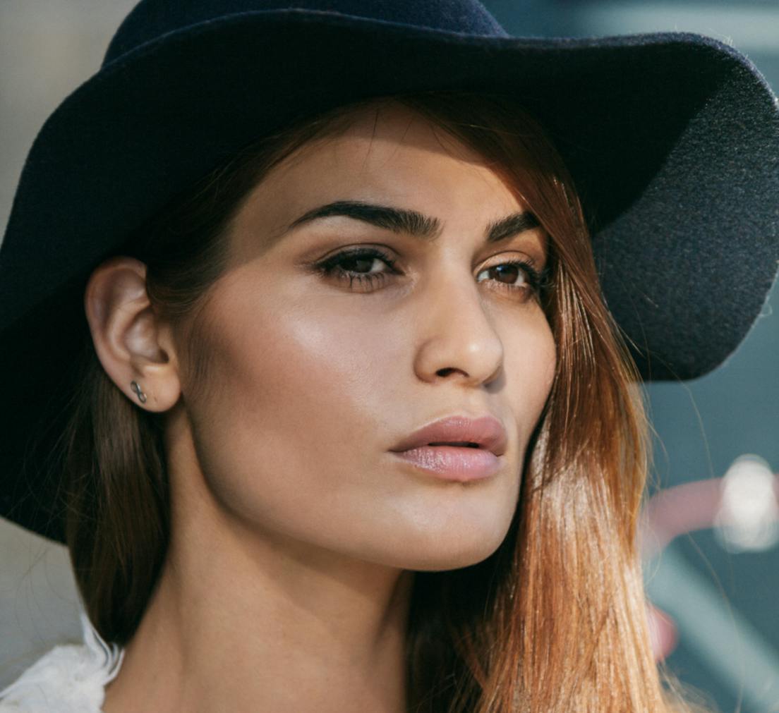 Beautiful woman wearing hat