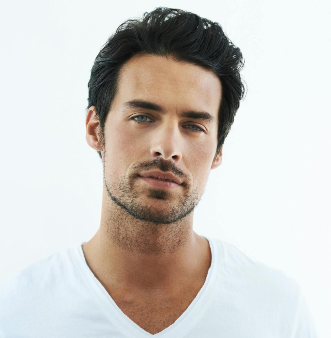 Handsome man white shirt and stubble