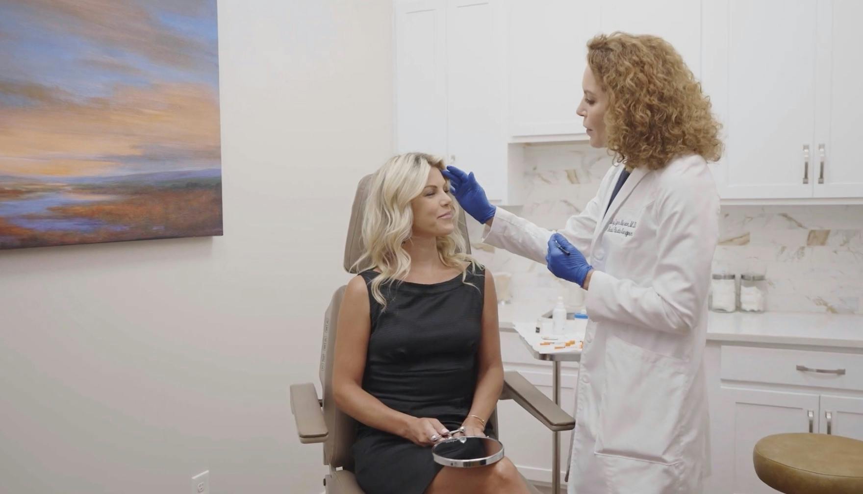 Dr. Moran Examining patient's face