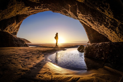 Lone traveller at sunset