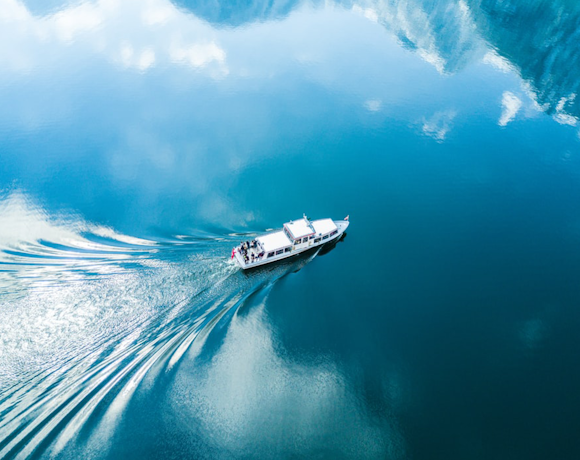 Ferry gliding across blue ocean