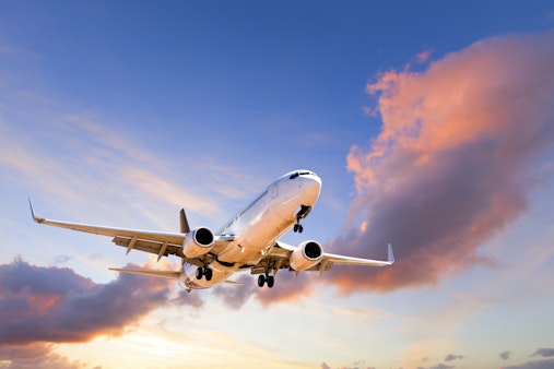 Aircraft landing at sunrise