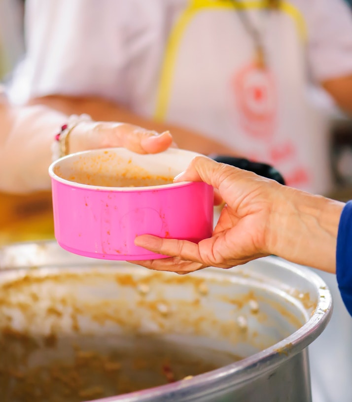 Woman accepting food