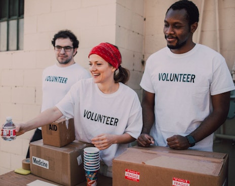 Volunteers giving aid