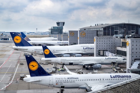 Parked Lufthansa planes at Frankfurt airport
