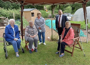 Members of Braidwater Seniors Group with Robin Swann