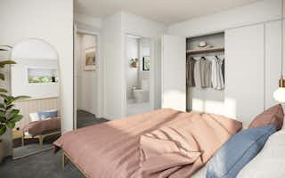 Modern double bedroom with wardrobe and ensuite