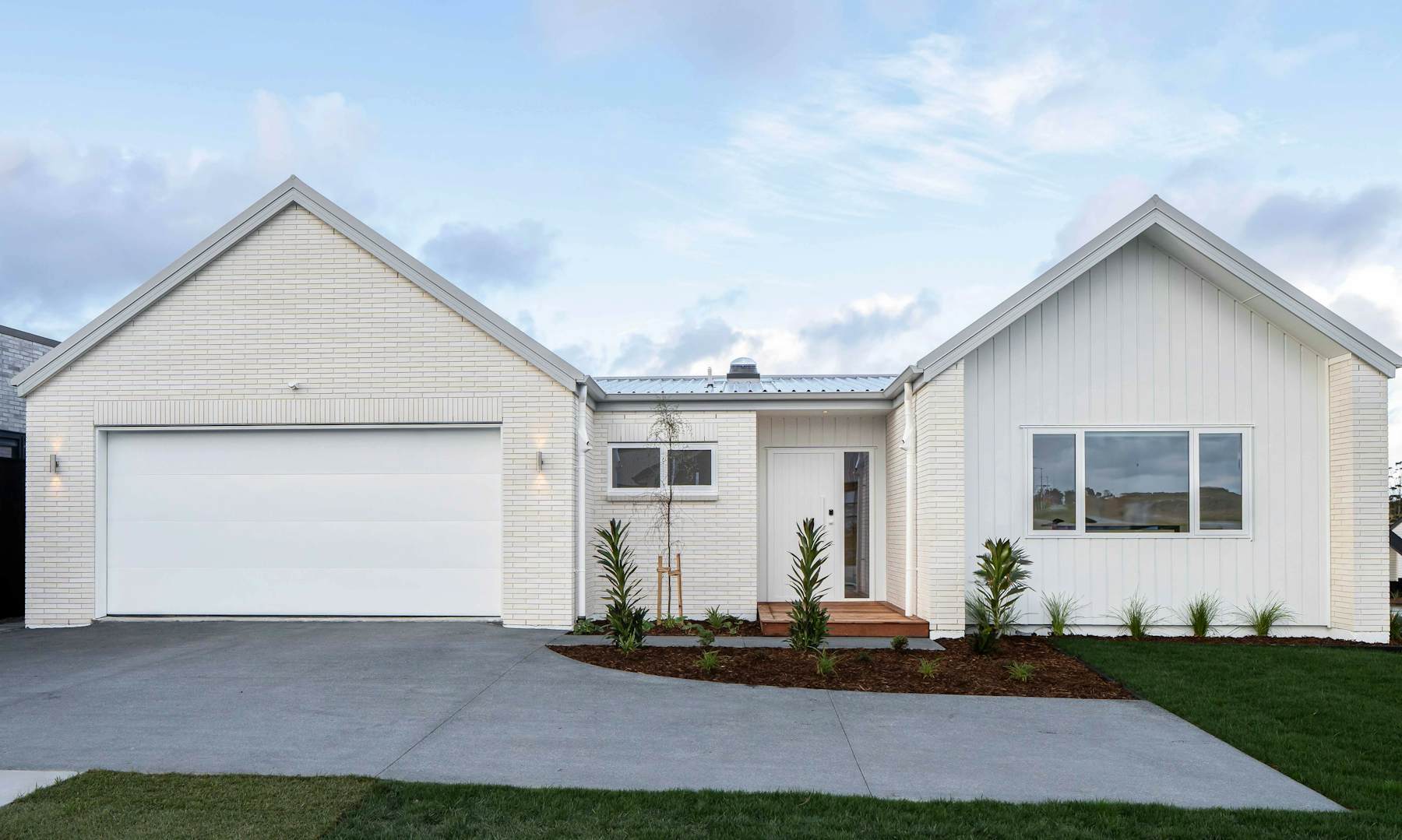 White brick home inspiration with gable roof