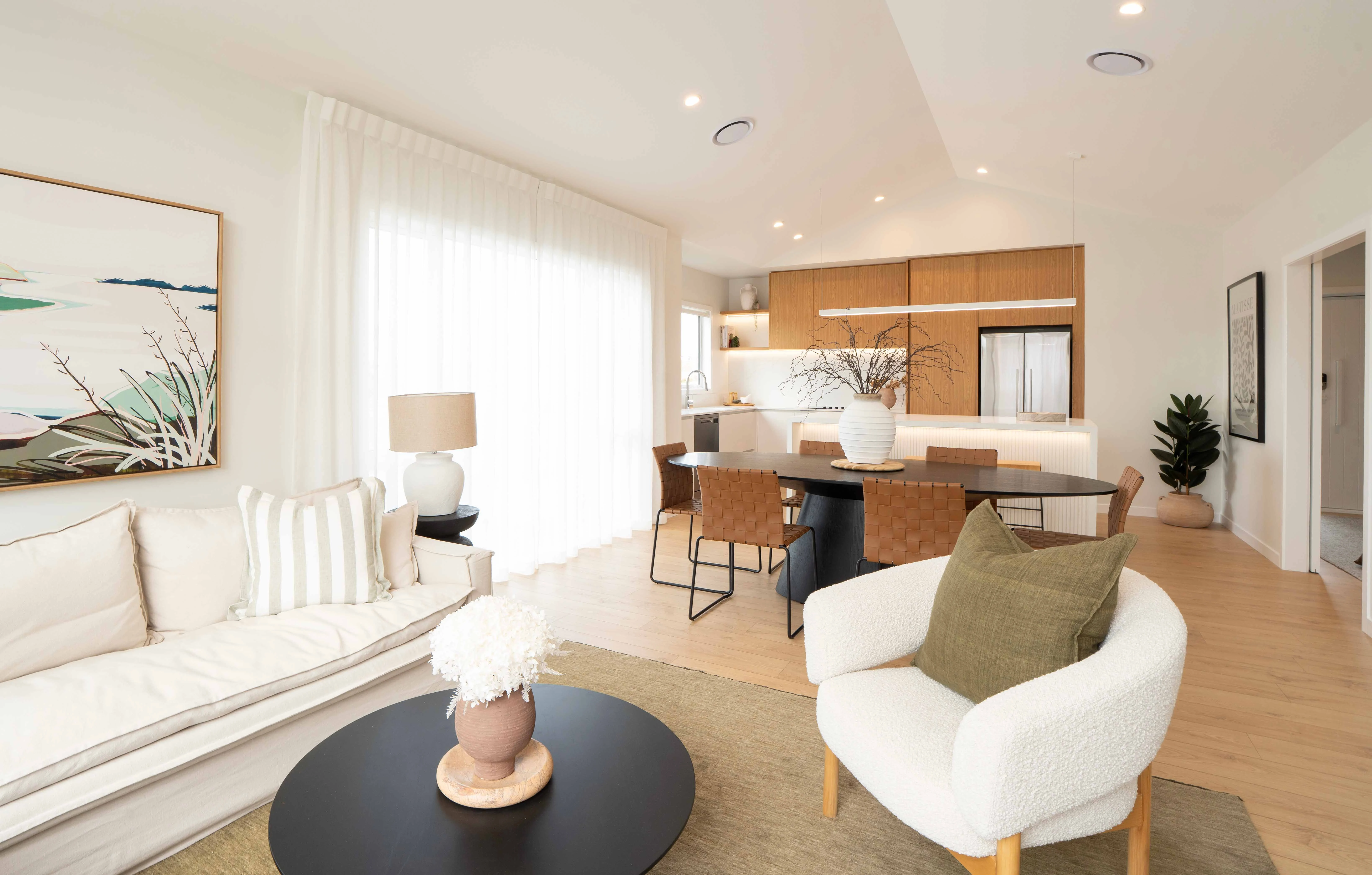 Milldale showhome interior with open-plan kitchen, dining, and modern living space