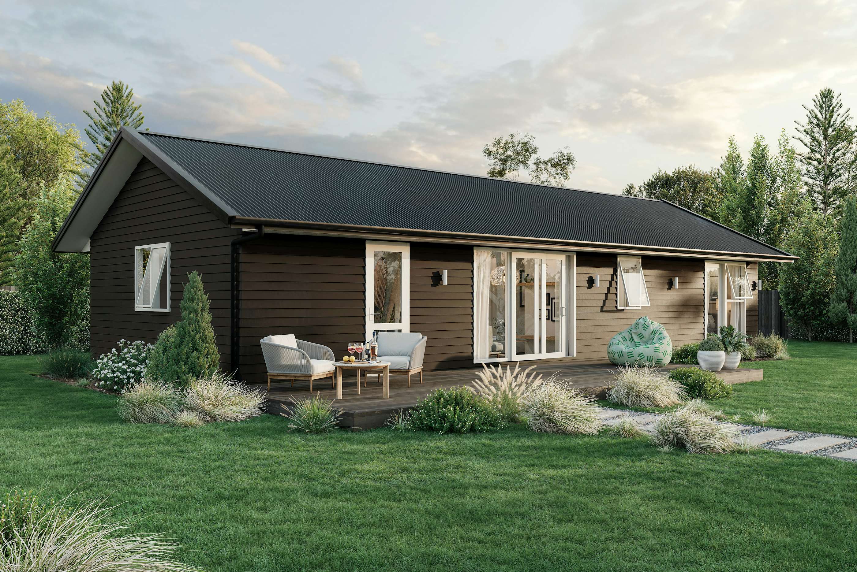 Minor Dwelling House with black weatherboard cladding and decking