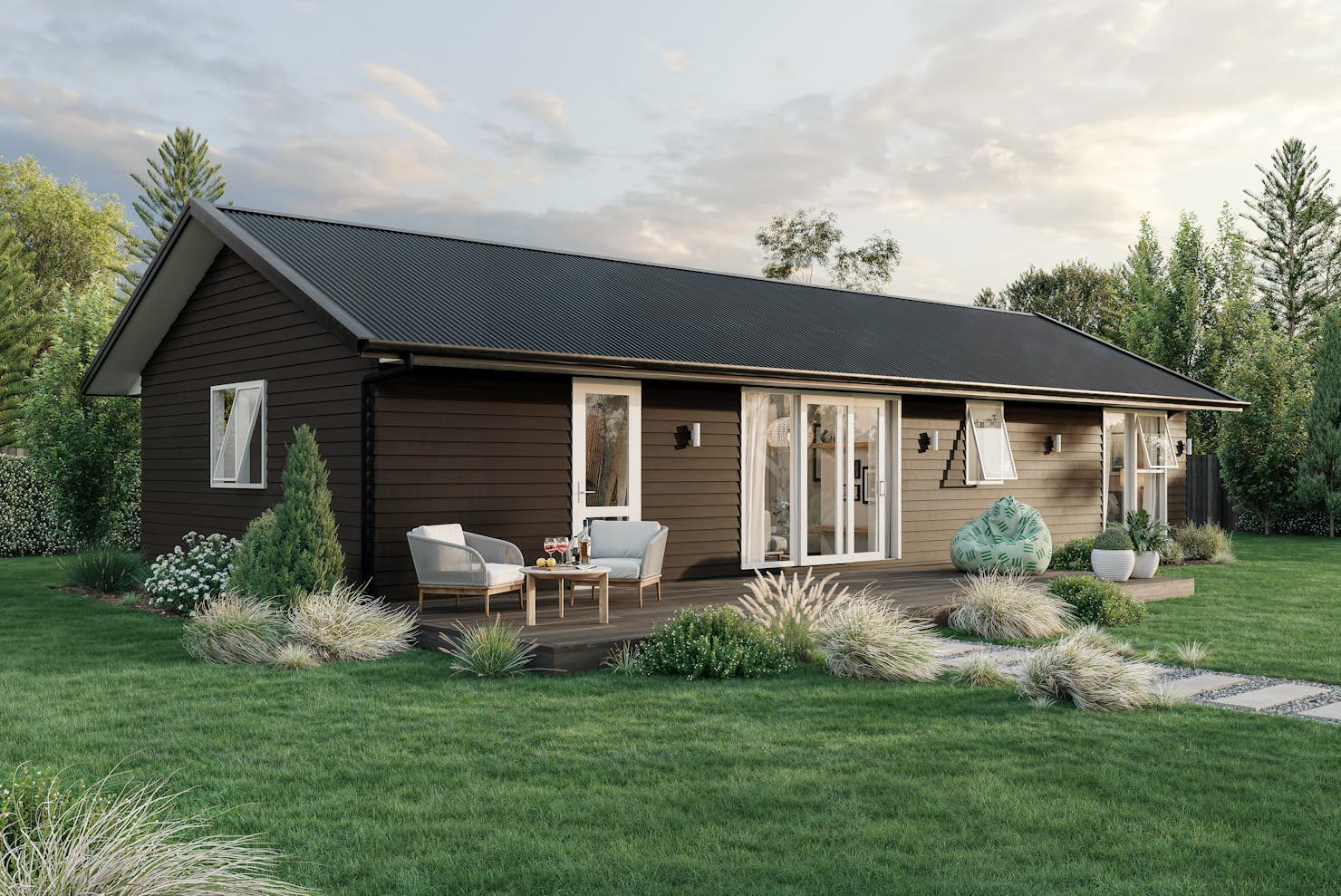 Minor Dwelling House with black weatherboard cladding and decking