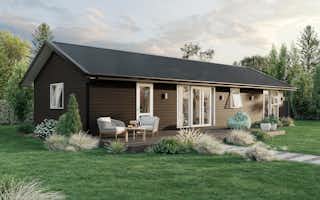 Minor Dwelling House with black weatherboard cladding and decking