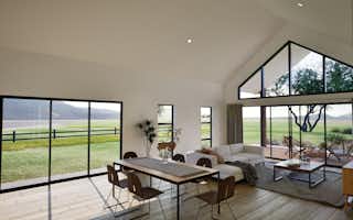 Signature Homes showhome with open-plan living, vaulted ceiling, and indoor-outdoor flow.