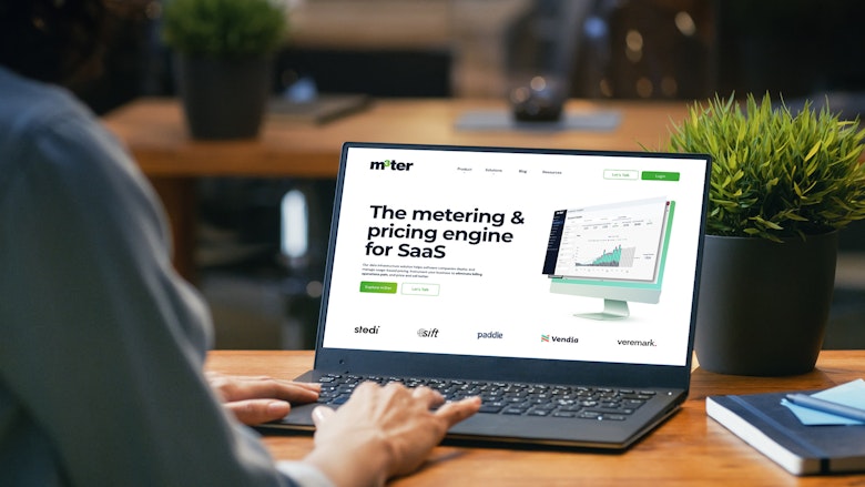 Picture of computer with m3ter website on front of it.