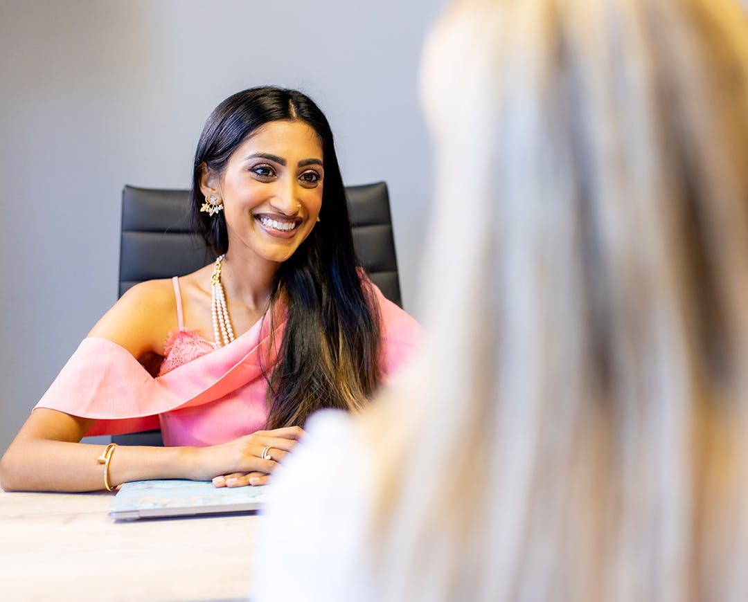 dr srinivasa in a pink dress