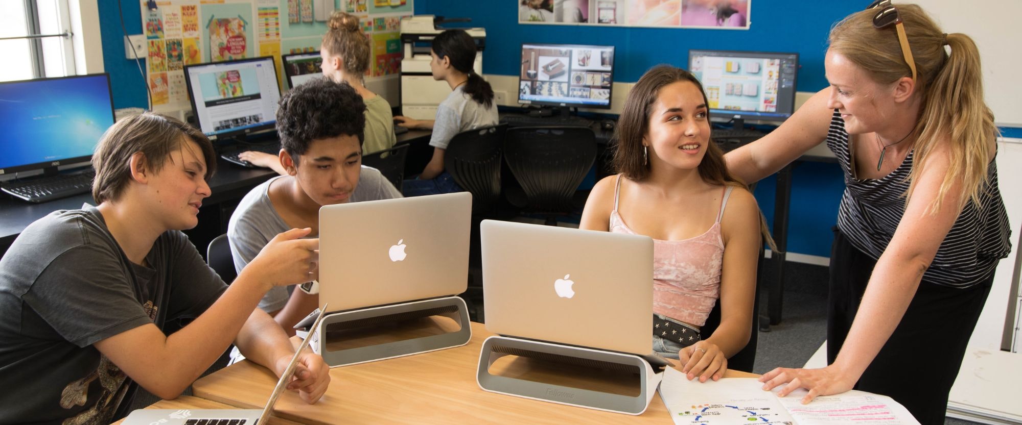 students with laptops