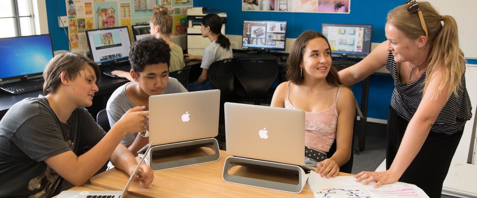 students with laptops