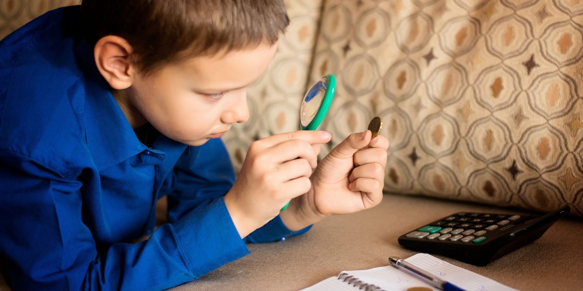 Student using magnifying glass