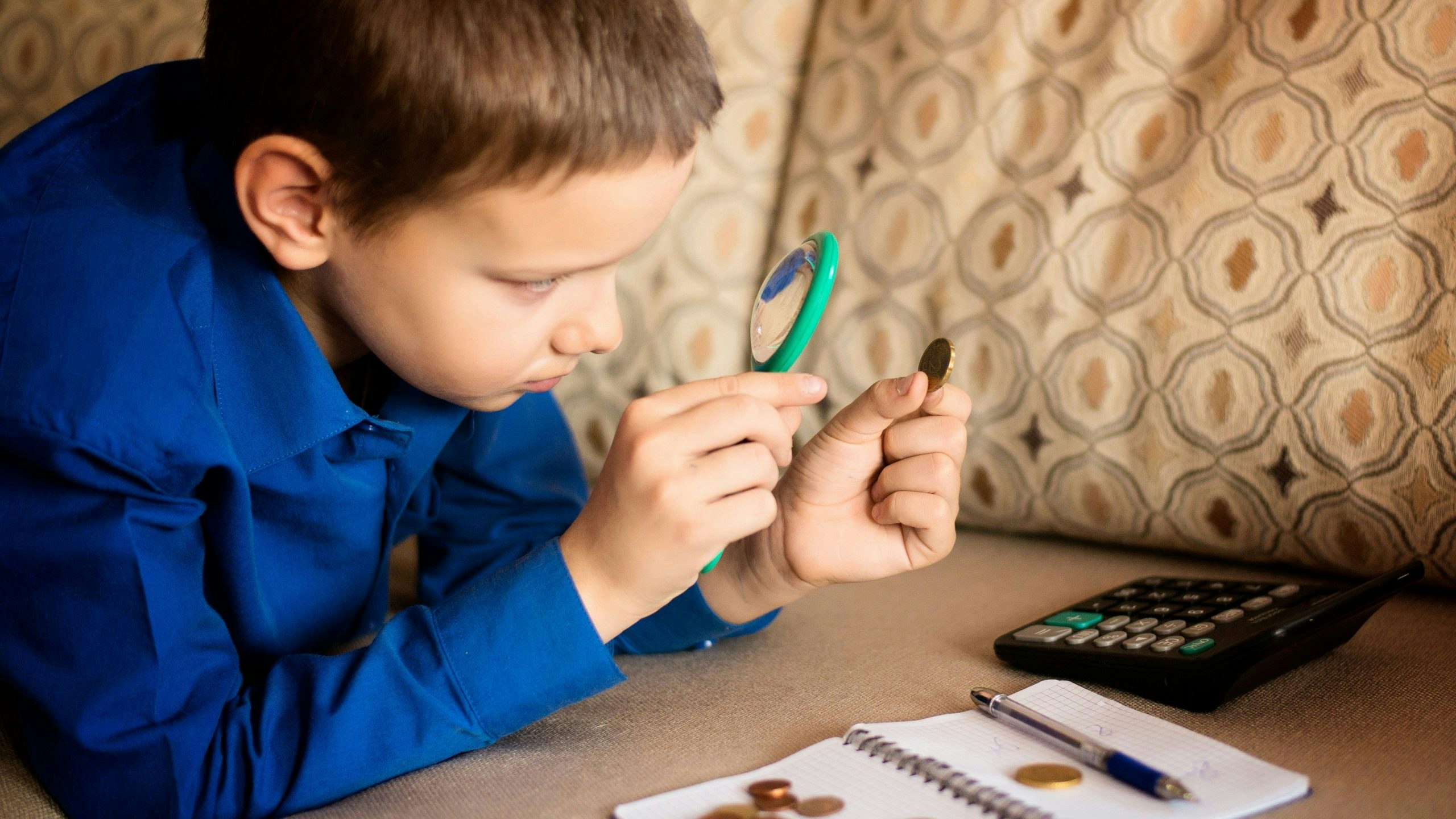 Student using magnifying glass
