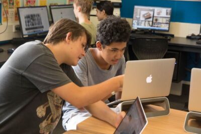 Students working on a laptop