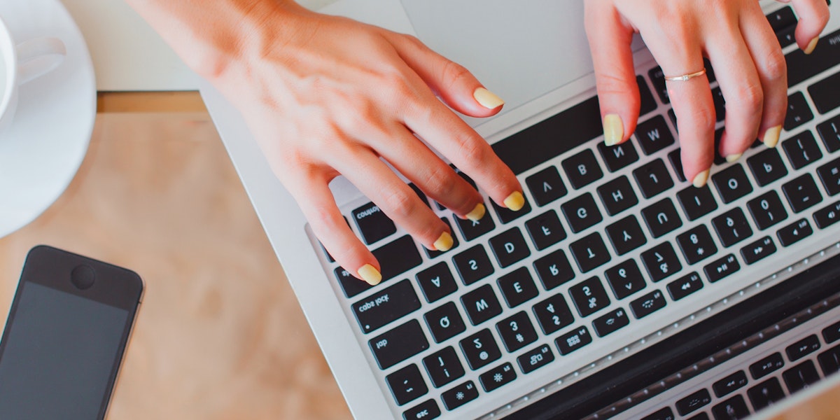 hands with laptop