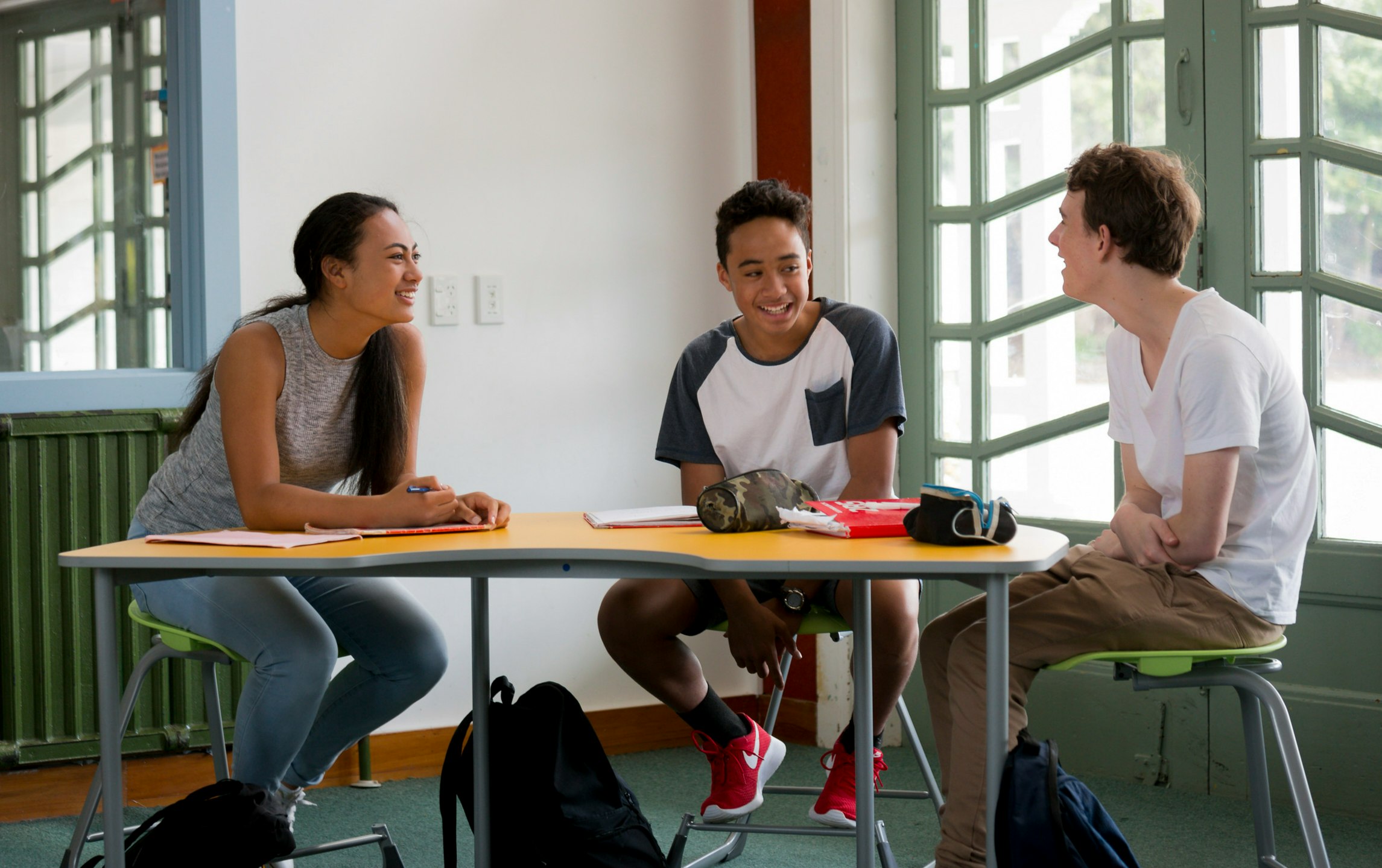 students sitting at a table