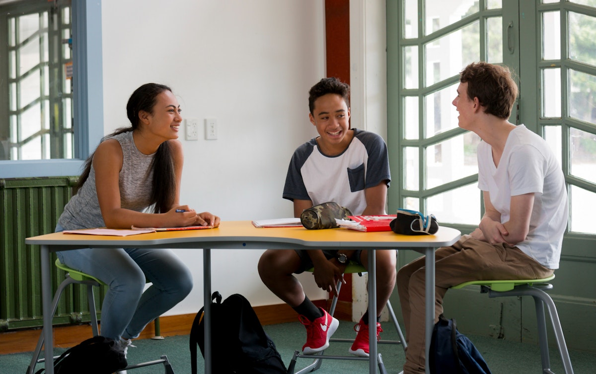 students sitting at a table