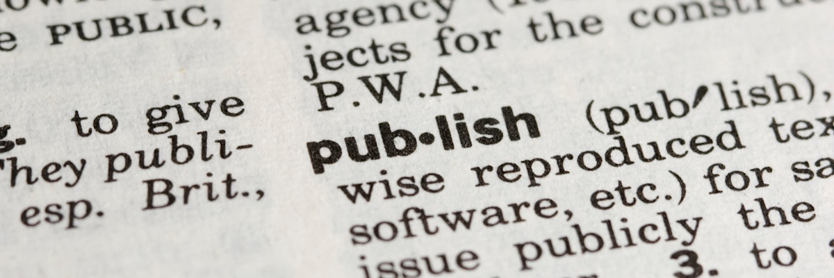 Close up of a dictionary definition of the word 'publish'