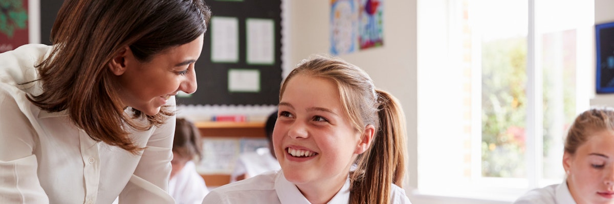 Teacher and a student in a classroom