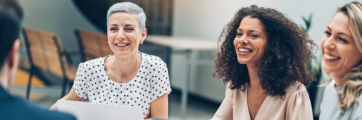 Three woman laughing