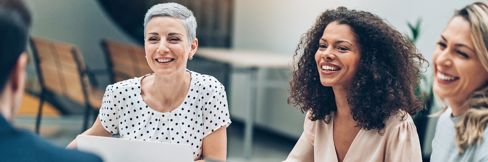 Three woman laughing