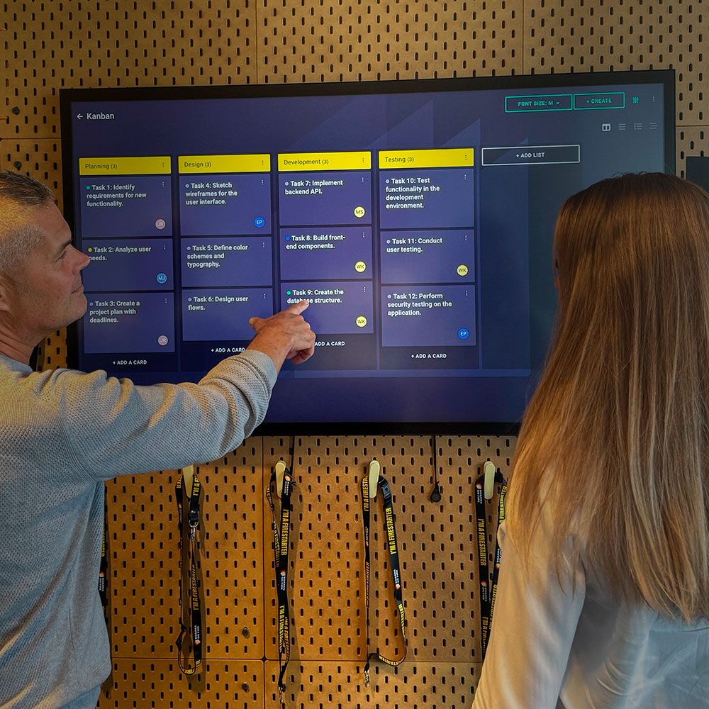 Two people having a meeting in Boards on Fire’s Kanban board mobile-image